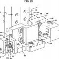 Ilustración 12 de Unidad de molde de soplado y máquina de moldeo por soplado que utiliza la misma