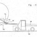 Ilustración 1 de Sistema para la carga y descarga de mercancía en una bodega de carga, especialmente de un avión, así como dispositivo de transporte intermedio para el mismo.