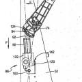 Ilustración 9 de Sistema de rotación y liberación de un reposacabeza accionado por motor de un miembro de mueble